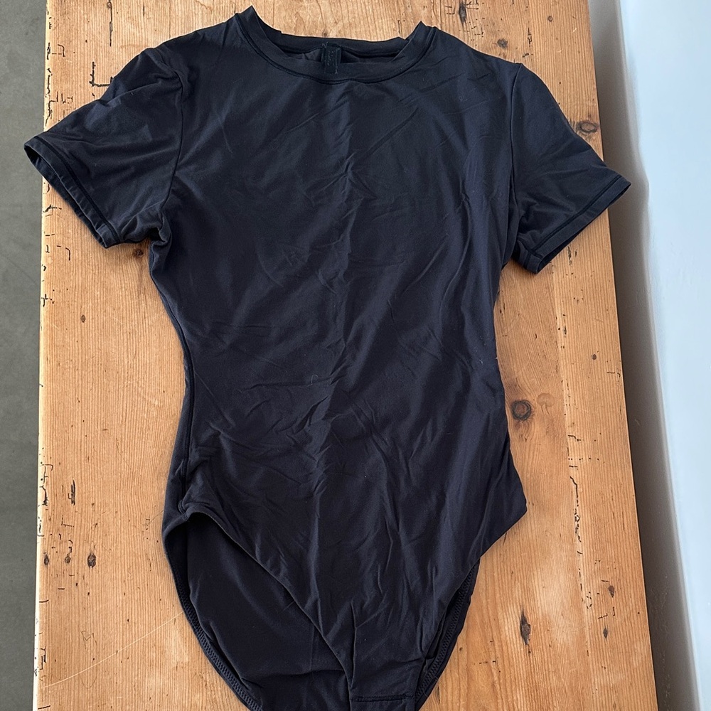 SKIMS size small bodysuit. NWOT. Never worn, too small.